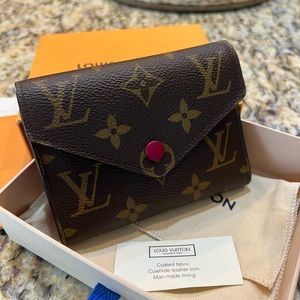 Authentic Louis Vuitton Victorine Wallet in Fuchsia